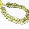 Natural Yellow Moss Aquamarine Smooth Pear Drops Briolette Bead Length is 4 Inches and Size 9mm to 11mm approx. These are 100% genuine aquamarine beads. Moss Aquamarine is green color variety of Beryl Gemstone species with green shimmery inclusions and many nautral inclusions. 